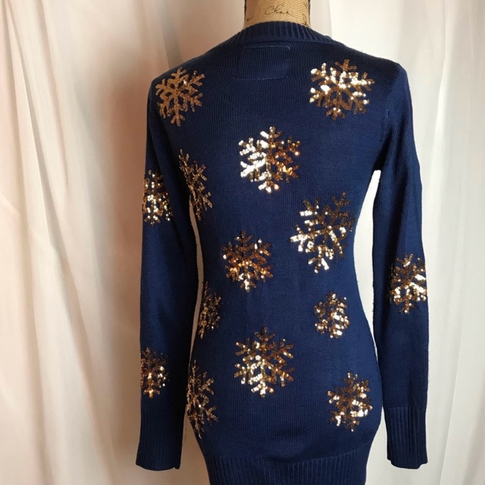 Beautiful holiday sparkling sweater dress! This dress will not disappoint!